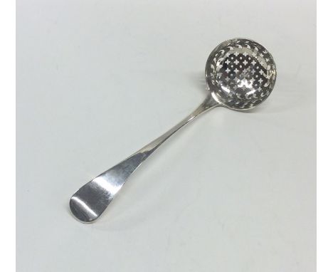 A Georgian silver OE pattern cream ladle with pierced bowl. London. By IB. Approx. 44 grams. Est. £30 - £50.