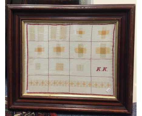An attractively framed and glazed sampler together with one other. Est. £50 - £80.