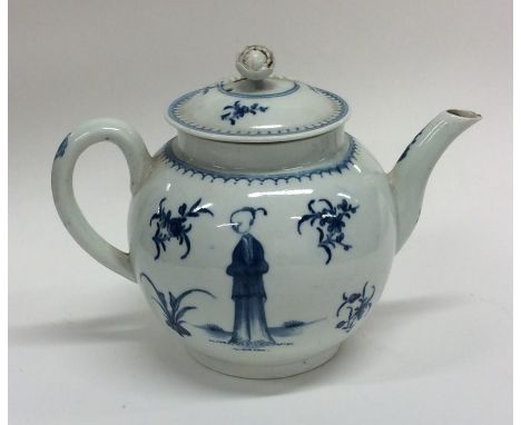 An early Worcester baluster shaped teapot decorated with figures and flowers of typical form. Est. £100 - £150.