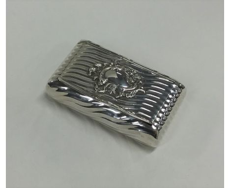 An unusual Antique Continental silver snuff box with swirl decoration to flush fitting. Approx. 77 grams. Est. £100 - £150.