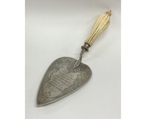 A good quality Victorian silver trowel with ivory handle. London. By TS. Approx. 244 grams. Est. £220 - £250.