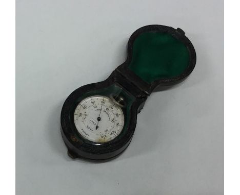 A cased silver mounted pocket barometer. By John Browning of London. Approx. 9.6 grams. Est. £60 - £80.