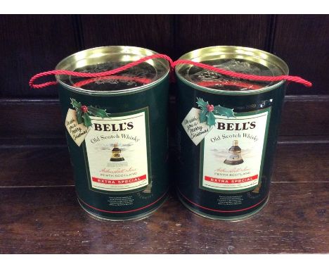 Two boxed Bell's Old Scotch Extra Special Whiskys in Christmas Wade Decanters dated 1988 and 1989. (2)