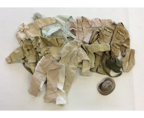 ACTION MAN: A selection of various khaki coloured items of clothing. Est. £10 - £15.