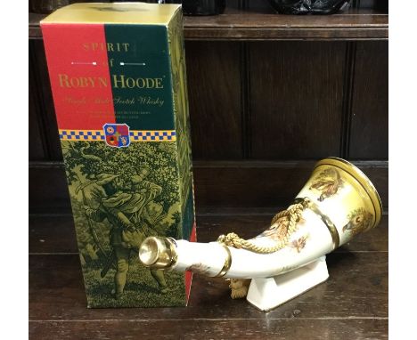 A boxed 70 cl Spirit of Robyn Hoode Single Malt Scotch Whisky in hunting horn shaped porcelain decanter. (1)