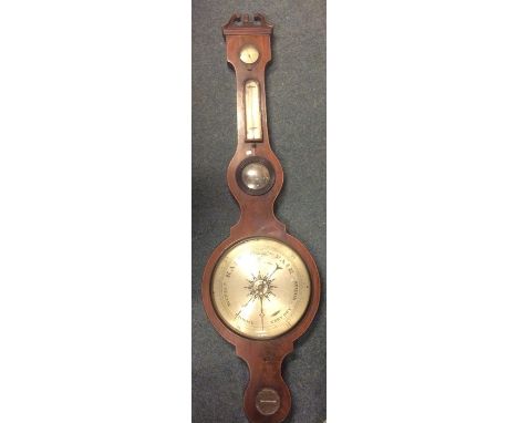 A mahogany banjo barometer with silvered dial. Est. £40 - £60.