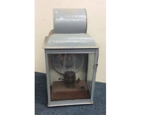 An unusual painted porch lamp. Est. £25 - £35.