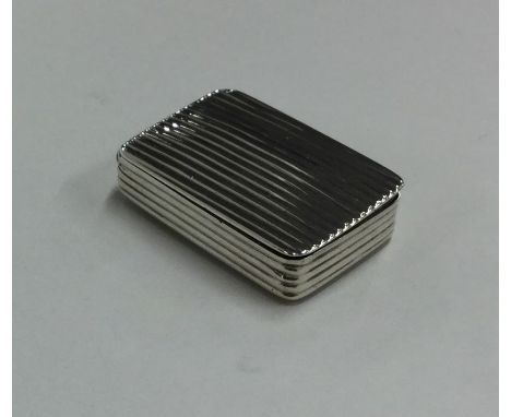 A small Georgian silver reeded snuff box with hinged lid. Birmingham. By Thomas Wilmore. Approx. 9.5 grams. Est. £80 - £120. 