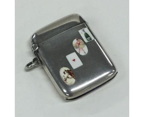 A novelty silver and enamel vesta case with hinged top. Approx. 27.3 grams. Est. £250 - £350.