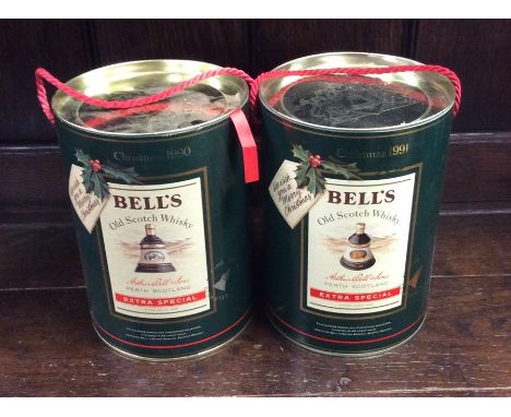 Two boxed Bell's Old Scotch Extra Special Whiskys in Christmas Wade Decanters dated 1990 and 1991. (2)