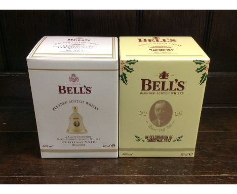 Two boxed Bell's Blended Scotch Whiskys in Christmas Wade Decanters dated 2010 and 2012. (2)