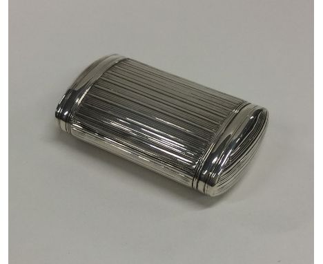 A reeded hinged top snuff box with gilt interior to flush fitting lid. Birmingham. By Samuel Pemberton. Approx. 59 grams. Est