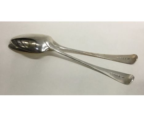 A pair of Georgian silver OE pattern tablespoons. London. By SH. Approx. 121 grams. Est. £25 - £35.