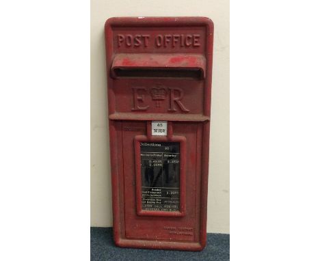 A cast iron Post Office 'E II R' red painted letter box mount. Approx. 60 cms x 25 cms. Est. £50 - £80.