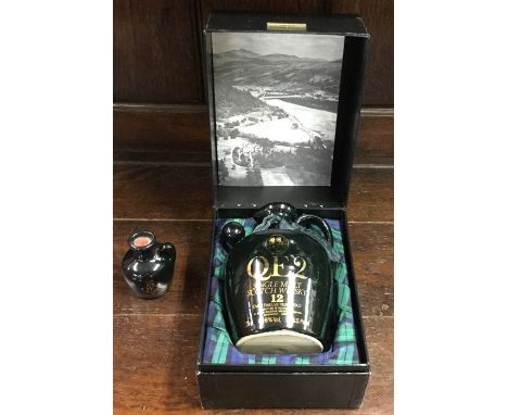 A boxed 75 cl ewer of Beinn Bhuidhe Holdings Limited QE2 Single Malt Scotch Whisky over 12 Years Old, together with a miniatu