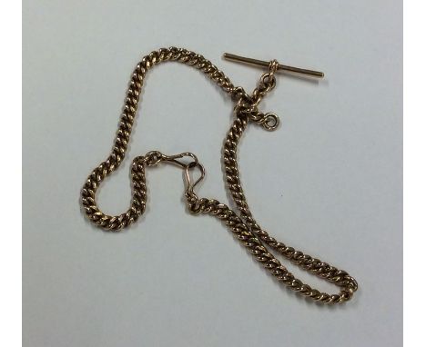A good 18 carat curb link watch chain with bar. Approx. 68 grams. Est. £2000 - £2500.