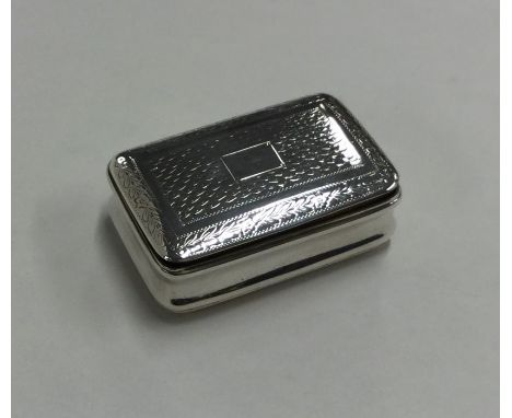 A rectangular Georgian silver hinged top snuff box with engine turned decoration and leaves. Birmingham. By Joseph Wilmore. A