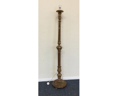A gilt lamp of circular form. Est. £20 - £30.
