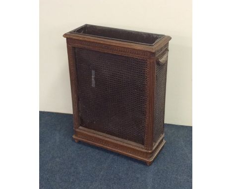 A Continental wicker stick stand with moulded edge. Est. £20 - £30.