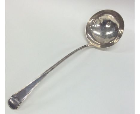 A Georgian OE pattern silver soup ladle. London. By GS. Approx. 135 grams. Est. £100 - £150.