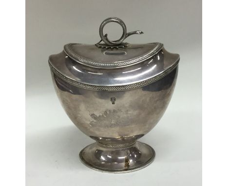 An unusual Dutch silver hinged top tea caddy with snake finial. Punched to base. Approx. 367 grams. Est. £400 - £500.