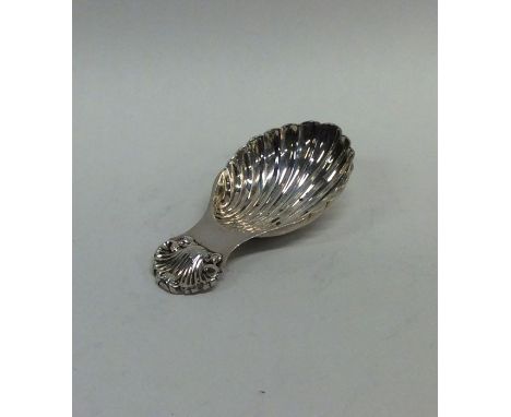 A modern cast silver caddy spoon with fluted bowl. Birmingham. By A E Jones. Approx. 18 grams. Est. £40 - £60.