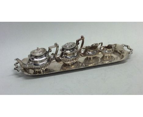 A small silver five piece tea and coffee service. Birmingham. By JR. Approx. 62 grams. Est. £100 - £150.
