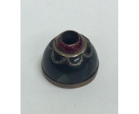 An unusual Russian enamel and silver bell push on tapering agate base. Approx. 17 grams. Est. £30 - £50.