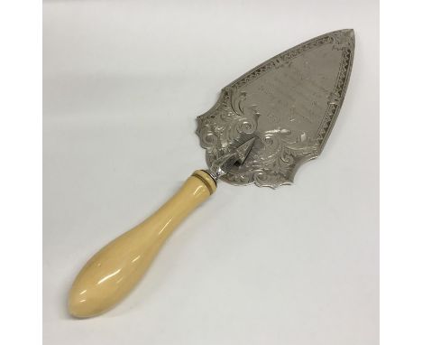 A good Victorian silver trowel with turned ivory handle and scroll decoration. Birmingham. By TW. Approx. 202 grams. Est. £15