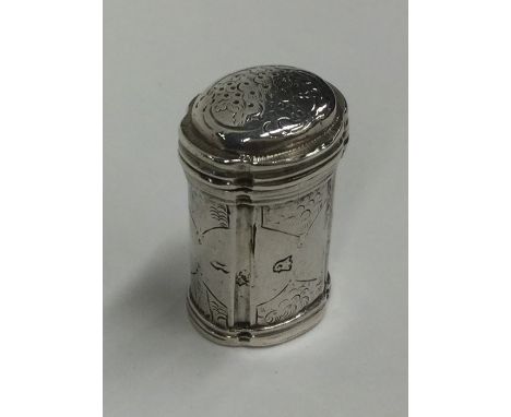 An Antique French hinged top snuff box decorated with scrolls and flowers to hinged top. Approx. 19 grams. Est. £60 - £80.