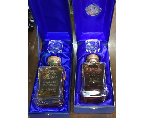 Two boxed Glencairn Crystal Studio glass decanters, one from the cruise ship Oriana containing 70 cl of Single Malt Scotch Wh