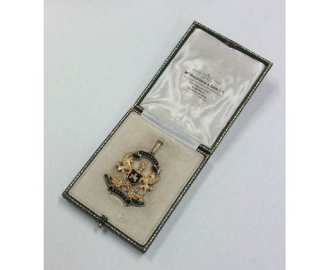A 15 carat medallion with enamel decoration inscribed, 'Mayoress, Exeter". Approx. 15 grams. Est. £300 - £400.