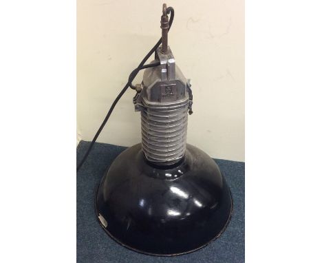A large retro Phillips studio lamp. Approx. 60 cms high. Est. £100 - £150.