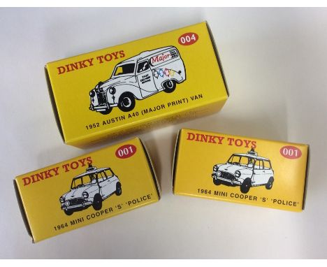 DINKY: A selection of three various boxed toy vehicles comprising 2 x 1964 Mini Cooper 'S' 'Police' cars numbered 001, togeth