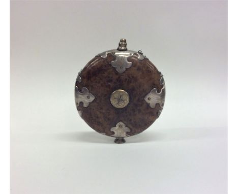 An unusual Norwegian wooden and  silver mounted flask. Approx. 13 cms high. Est. £300 - £400.