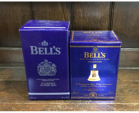 1 x boxed Bell's Extra Special Old Scotch Whisky Aged 8 Years in commemorative Wade decanter, together with 1 x boxed Bell's 