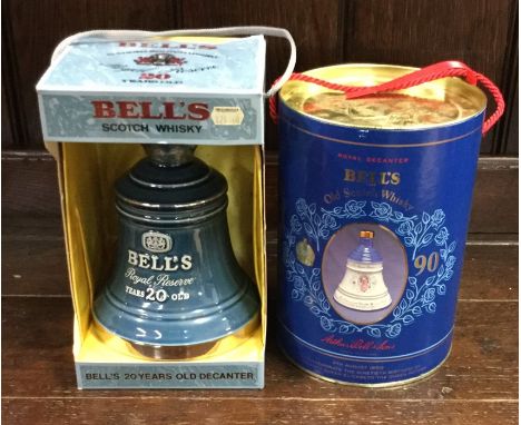 1 x Bell's Royal Reserve 20 Years Old Blended Scotch Whisky in blue Wade decanter, together with a cylindrical boxed Bell's O