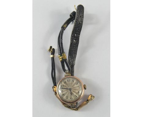 Vintage Rolex ladies wrist watch having a 9ct gold case, enamelled dial and roped leather strap