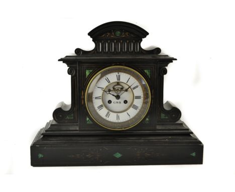 A impressive 19th century black slate mantle clock of architectural form. For Great Western Railways. [41cm high approx). The