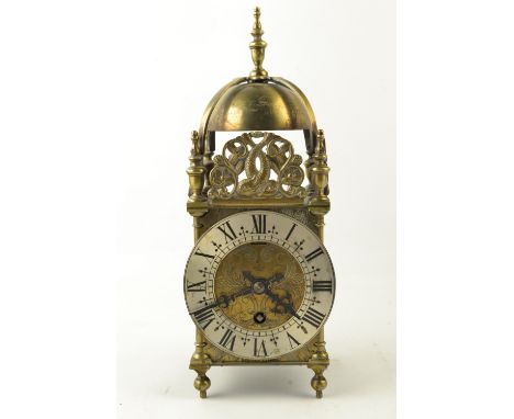 Brass lantern clock by Elliot approx 30cm high