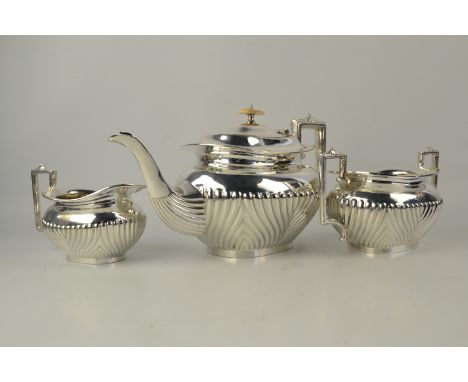 A good quality 3 piece silver plated tea service, having half fluted design.[ Presentation inscription ]