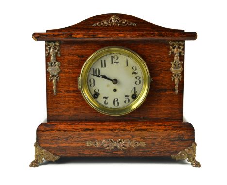 American veneered mantle clock decorated with enameled dial, guilt metal mounts and feet, 31cm high