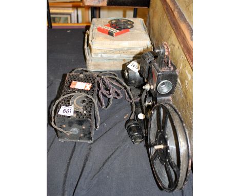 Vintage Pathescope reel projector with films