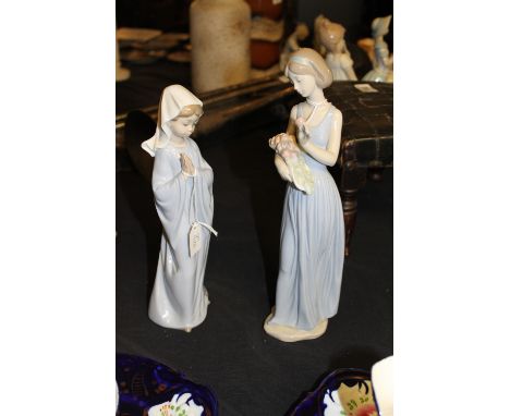 Two Nao figures including girl with flower basket