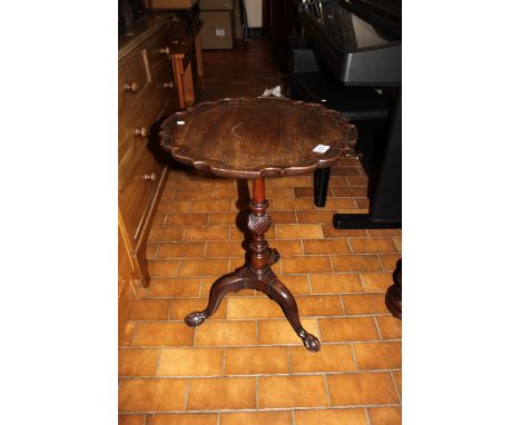 Pie crust occasional table on tripod base with ball and claw feet