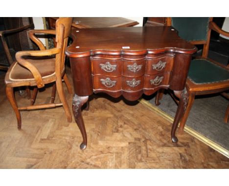 Serpentine fronted mahogany two drawer console table on cabriole feet, W ~ 75cm