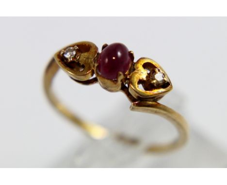 18ct gold ( tested as marks rubbed) ring set with diamonds and a cabouchon ruby, size R