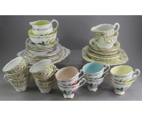 An Intermegge Roslyn china tea set6: 6 cups and 4 saucers, 6 tea plates, 1 sandwich plate, milk jug, sugar bowl: Rose and Lea