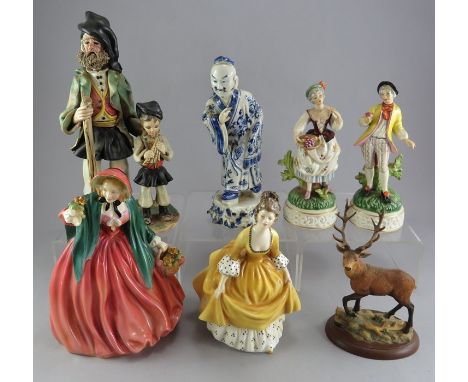 A group of ceramic figure to include a Border Fine Art stag and two Royal Doulton figures; Lady Charmain and Coralie and othe