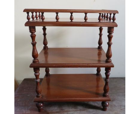 A Victorian three-tier display shelf with gallery and turned bobbin-type uprights. 51 cm tall.&nbsp;